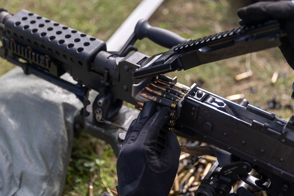 MACS-4 Marines fire M240 machine guns during live fire range