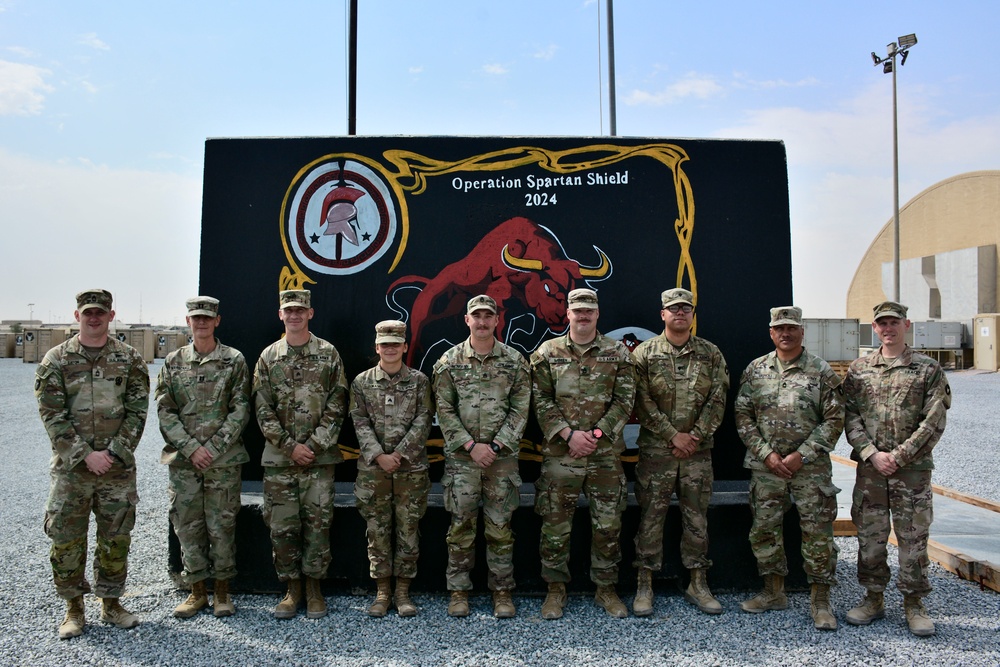 Soldiers stand for section photo.