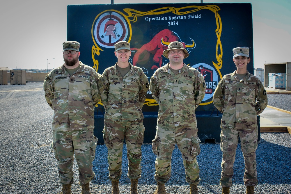 Soldiers stand for section photo.