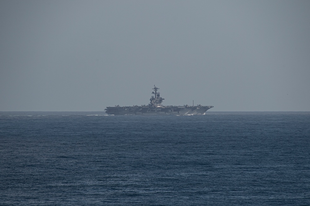 USS Carl Vinson Steams Near the USS Nimitz