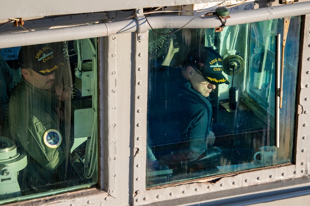 Commanding and Executive Officers Guide USS Nimitz into Port