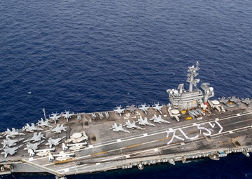 USS George Washington Sailors greet Japan with flight deck message