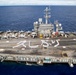 USS George Washington Sailors greet Japan with flight deck message