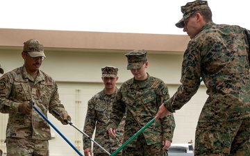 18th CES Airmen and 3DMEDBN Sailors handle Okinawan snakes