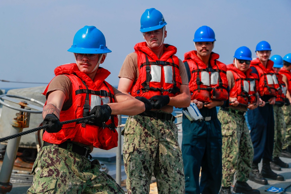 Michael Murphy conducts a fueling-at-sea with Abraham Lincoln