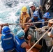 Michael Murphy conducts a fueling-at-sea with Abraham Lincoln