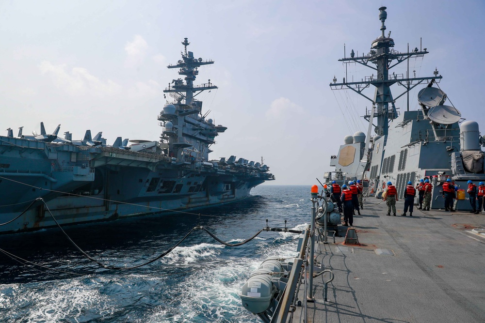 Michael Murphy conducts a fueling-at-sea with Abraham Lincoln