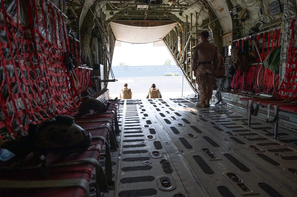 U.S. Air Force Pararescuemen Await Takeoff on Marine Corps KC-130J