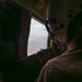 U.S. Marine Corps Loadmaster Watches VM-22 During Flyover