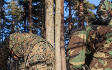 U.S. Marines with Chemical Biological Radiological and Nuclear Defense Conduct Decontamination Training