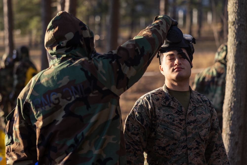 U.S. Marines with Chemical Biological Radiological and Nuclear Defense Conduct Decontamination Training