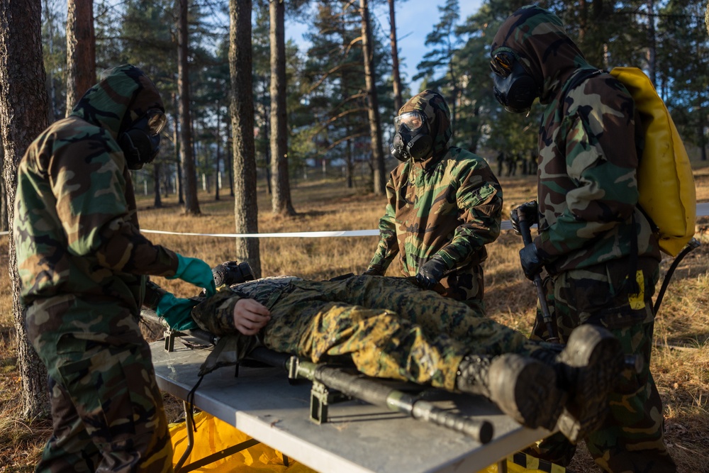 U.S. Marines with Chemical Biological Radiological and Nuclear Defense Conduct Decontamination Training