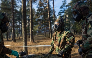 U.S. Marines with Chemical Biological Radiological and Nuclear Defense Conduct Decontamination Training