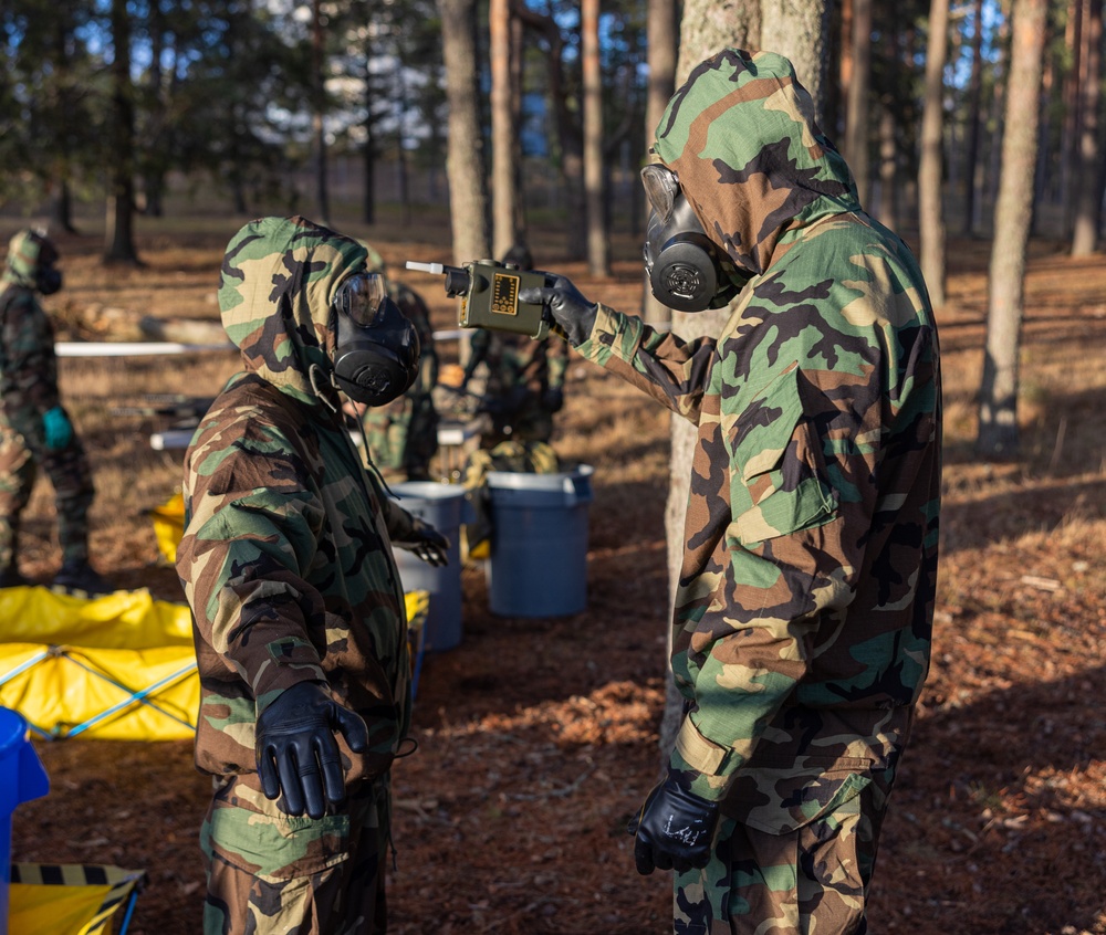 U.S. Marines with Chemical Biological Radiological and Nuclear Defense Conduct Decontamination Training