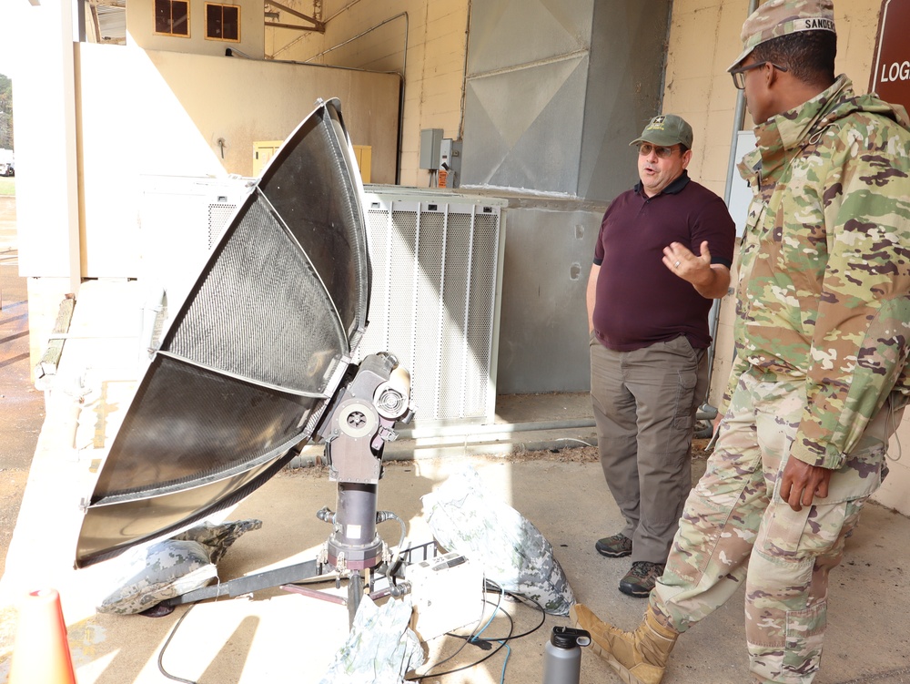 Signals Soldier assigned to Transportation unit learns how to operate Hawk Eye satellite