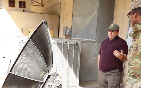 Signals Soldier assigned to Transportation unit learns how to operate Hawk Eye satellite