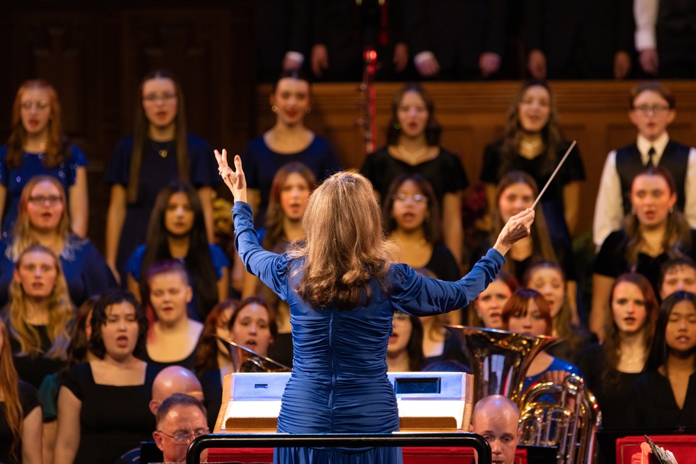 A Choir Director from the Granite School District Conducts at the 69th Annual Veterans Day Concert