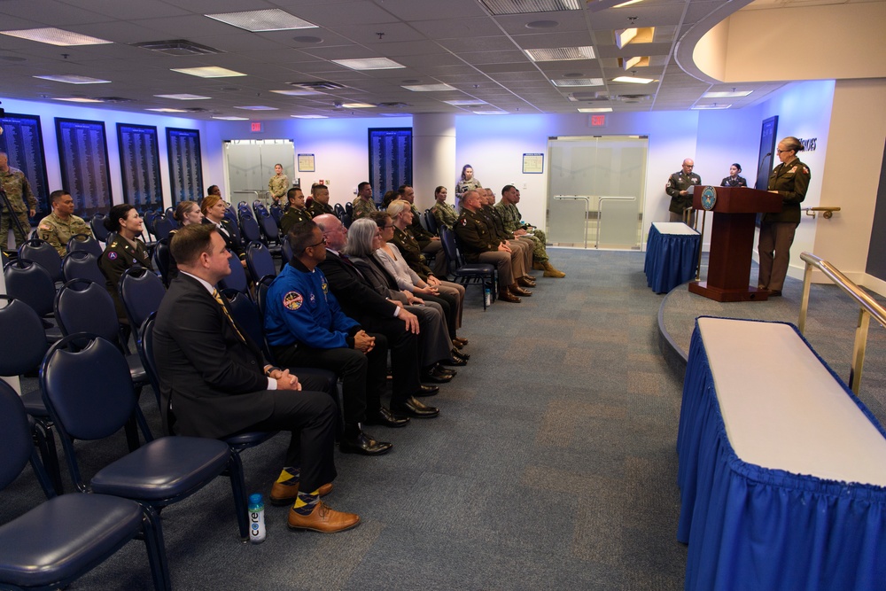 U.S. Army Astronaut MAJ Kathleen Rubins is awarded the Basic Aviator Badge with the Astronaut Device and Space Operations Badge the Pentagon