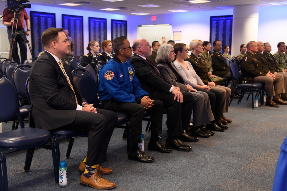 U.S. Army Astronaut MAJ Kathleen Rubins is awarded the Basic Aviator Badge with the Astronaut Device and Space Operations Badge the Pentagon