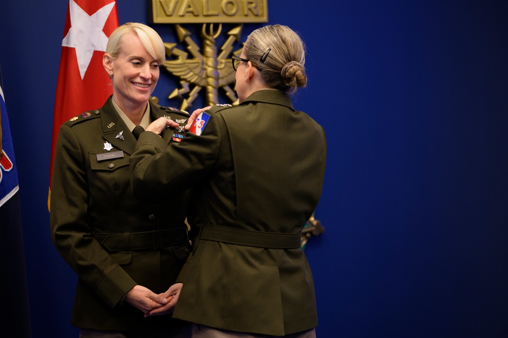 U.S. Army Astronaut MAJ Kathleen Rubins is awarded the Basic Aviator Badge with the Astronaut Device and Space Operations Badge the Pentagon