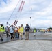 Members of the Defense Policy Review Initiative, U.S. Army Corps of Engineers, and the Okinawa Defense Bureau tour construction for new base housing