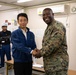 Members of the Defense Policy Review Initiative, U.S. Army Corps of Engineers, and the Okinawa Defense Bureau tour construction for new base housing