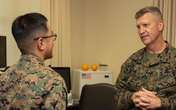 Brigadier General Collins Congratulates the Marine and NCO of the Quarter