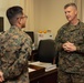 Brigadier General Collins Congratulates the Marine and NCO of the Quarter