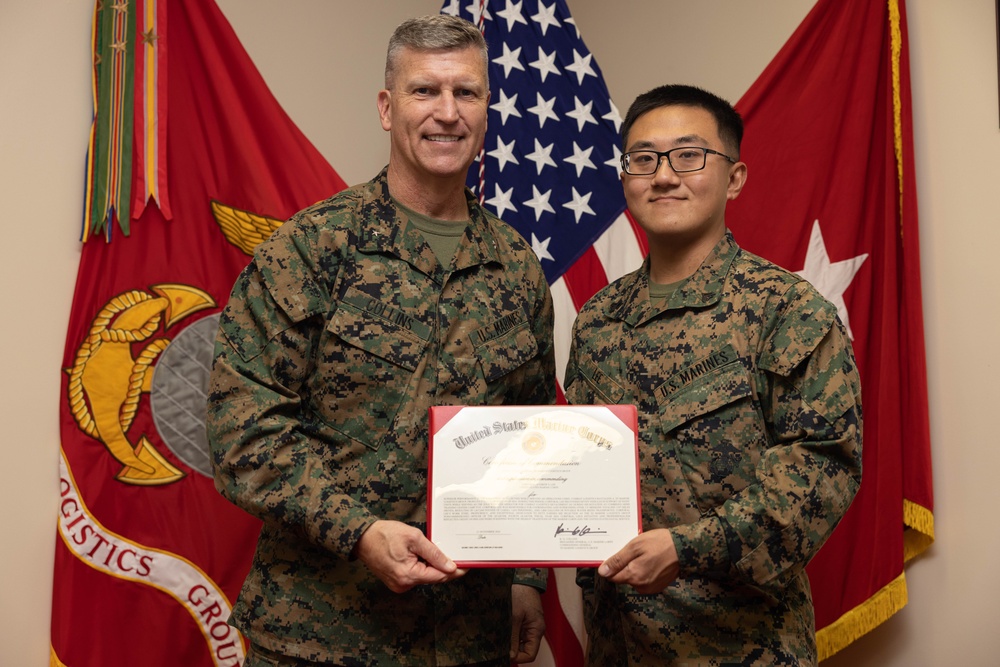 Brig. Gen. Collins Congratulates 3rd MLG Marine and NCO of the Quarter