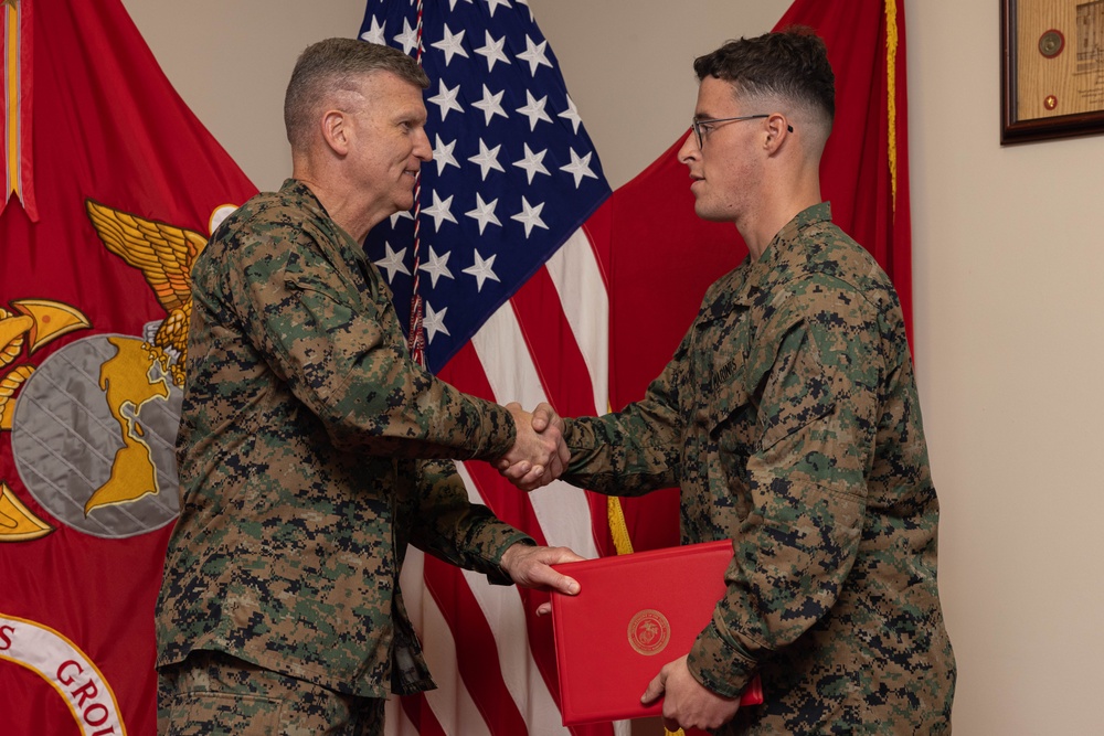 Brig. Gen. Collins Congratulates 3rd MLG Marine and NCO of the Quarter