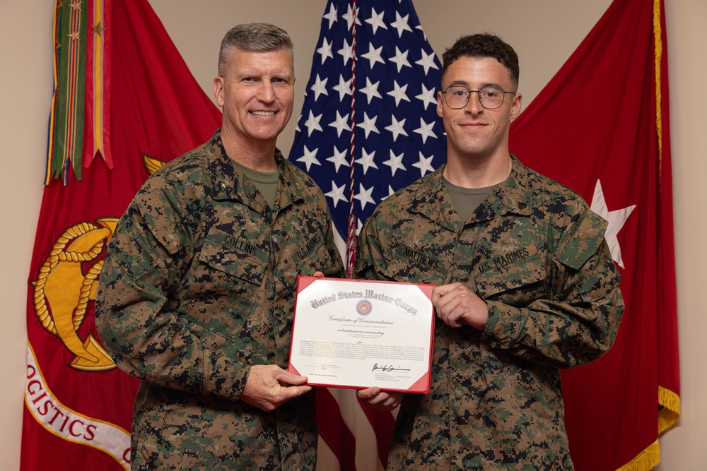 Brig. Gen. Collins Congratulates 3rd MLG Marine and NCO of the Quarter