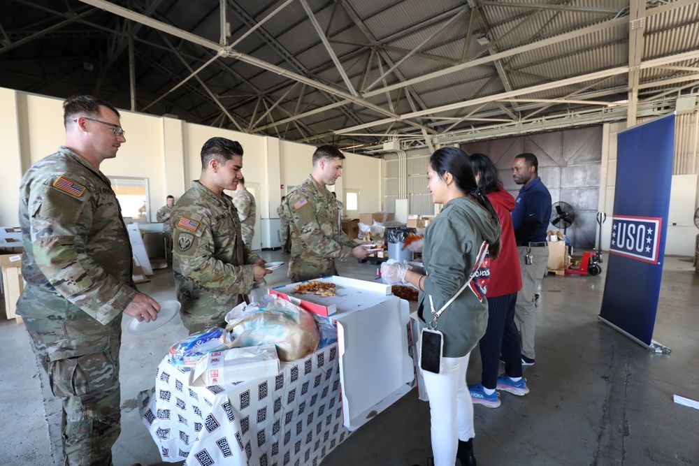 USO, Army Community Service bring slice of joy to Soldiers in Japan with ‘Operation Pizza Drop’