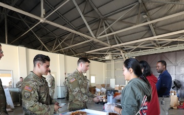 USO, Army Community Service bring slice of joy to Soldiers in Japan with ‘Operation Pizza Drop’