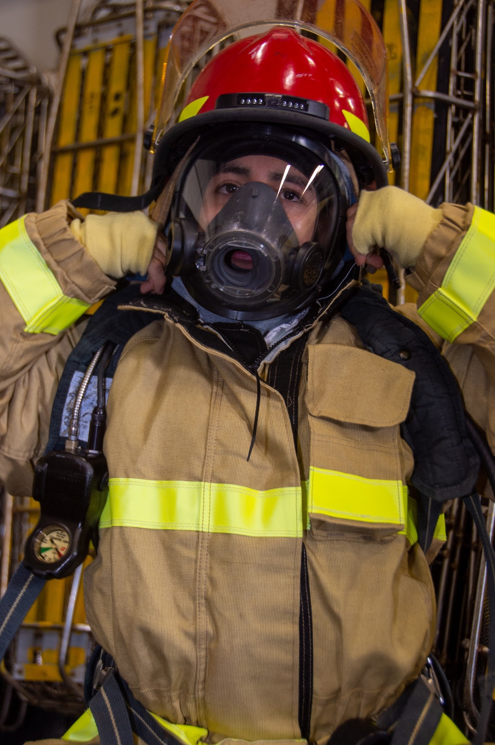 USS Ronald Reagan (CVN 76) Sailors participate in a damage control training drill