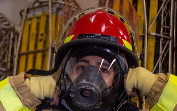 USS Ronald Reagan (CVN 76) Sailors participate in a damage control training drill