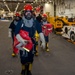 USS Ronald Reagan (CVN 76) Sailors participate in a damage control training drill