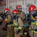 USS Ronald Reagan (CVN 76) Sailors participate in a damage control training drill