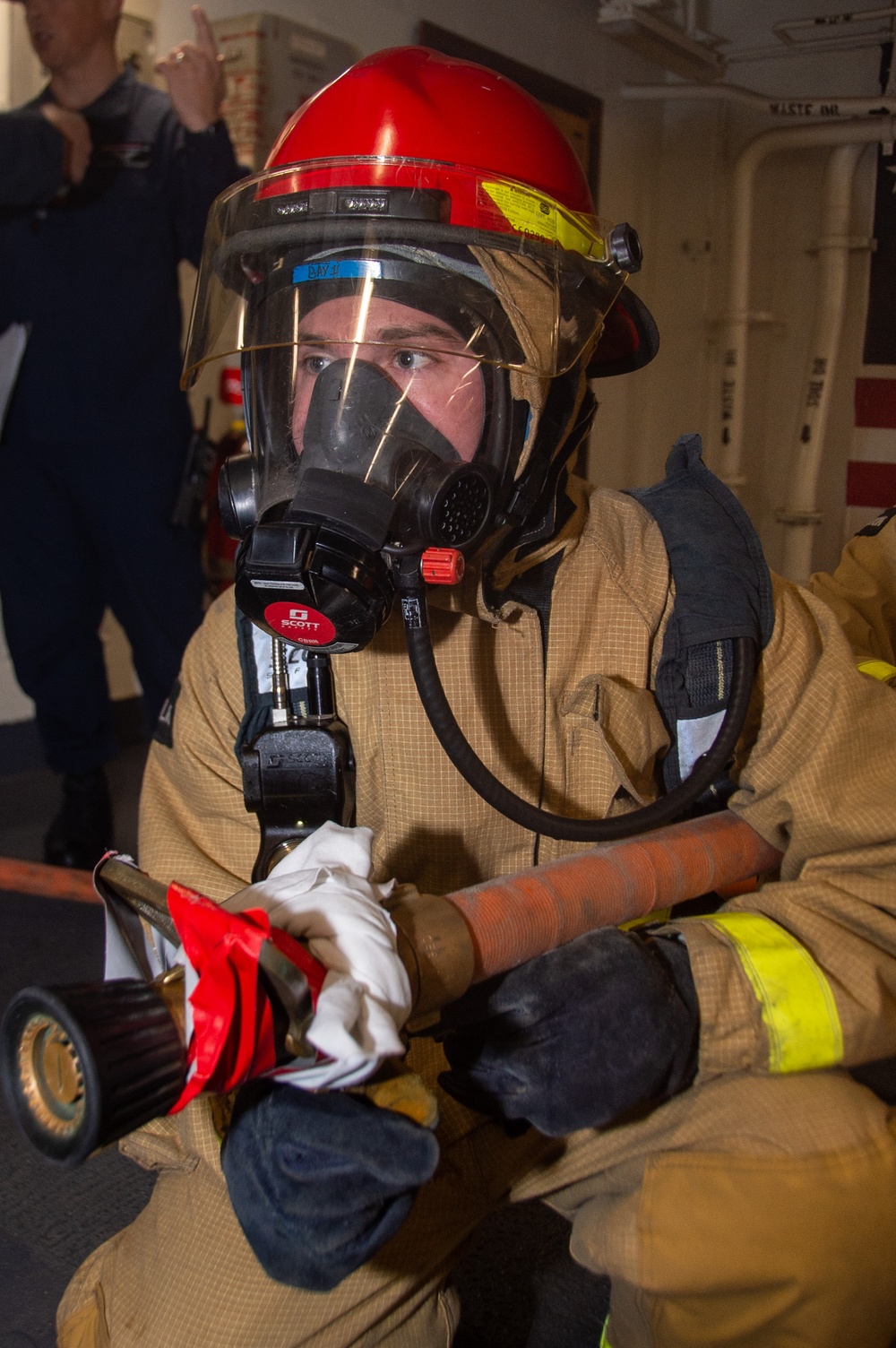 USS Ronald Reagan (CVN 76) Sailors participate in a damage control training drill