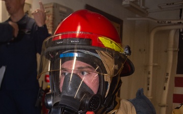 USS Ronald Reagan (CVN 76) Sailors participate in a damage control training drill