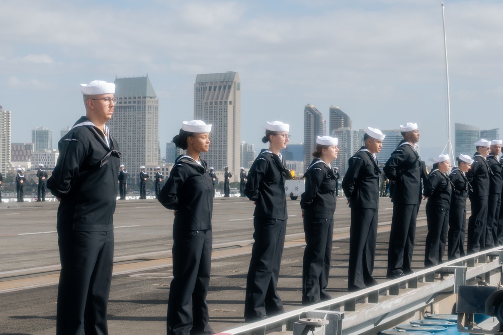 USS Carl Vinson (CVN 70) Sailors Man the Rails while departing San Diego