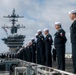 USS Carl Vinson (CVN 70) Sailors Man the Rails while departing San Diego