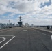 USS Carl Vinson (CVN 70) Sailors Man the Rails while departing San Diego