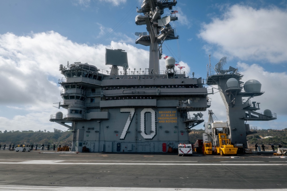 USS Carl Vinson (CVN 70) Sailors Man the Rails while departing San Diego