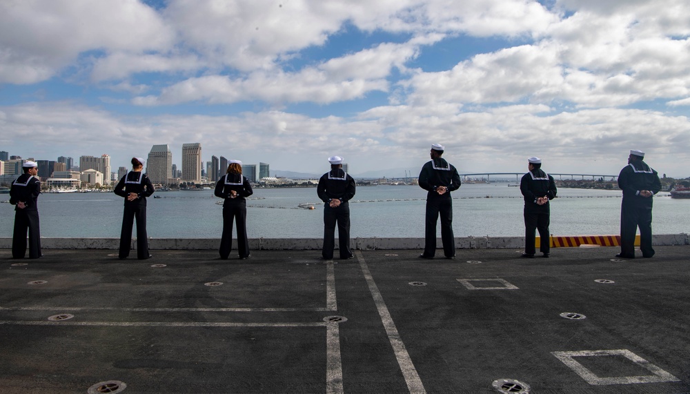 USS Carl Vinson (CVN 70) Sailors Man the Rails while departing San Diego