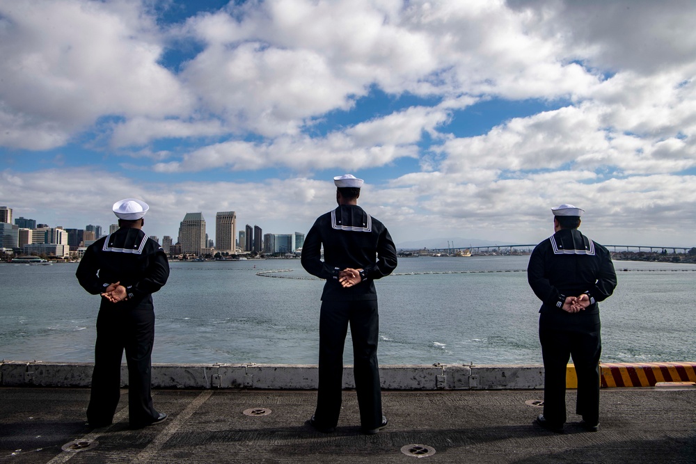 USS Carl Vinson (CVN 70) Sailors Man the Rails while departing San Diego