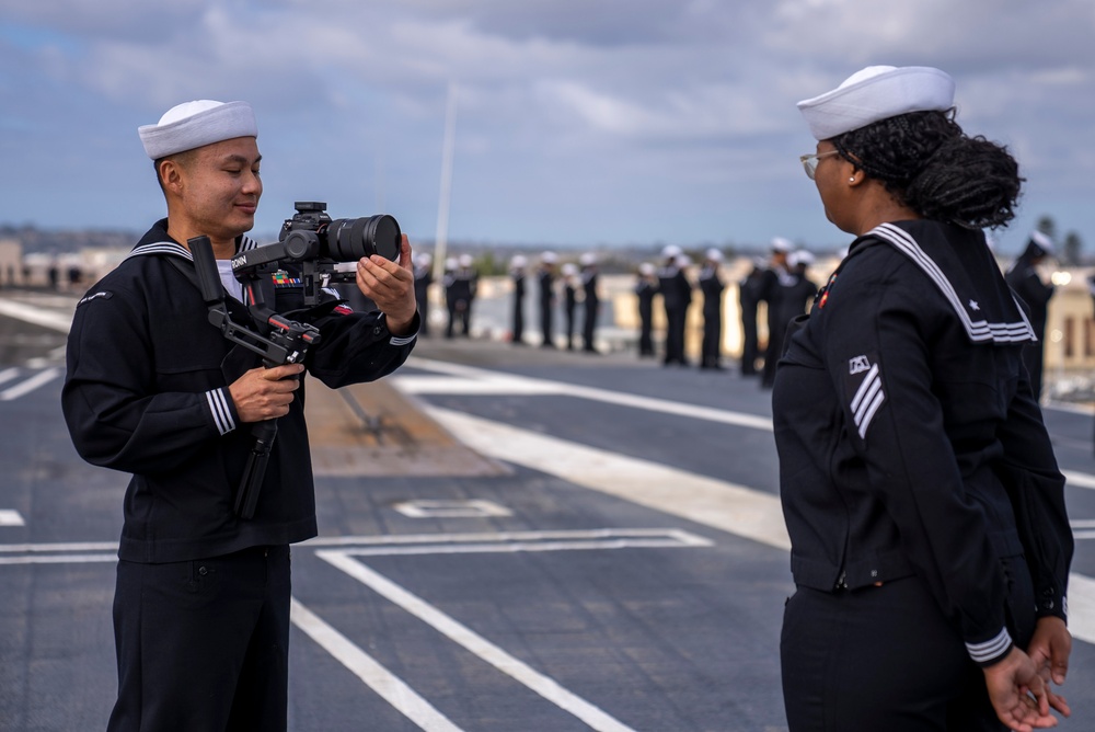 USS Carl Vinson (CVN 70) Sailors Man the Rails while departing San Diego