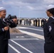 USS Carl Vinson (CVN 70) Sailors Man the Rails while departing San Diego