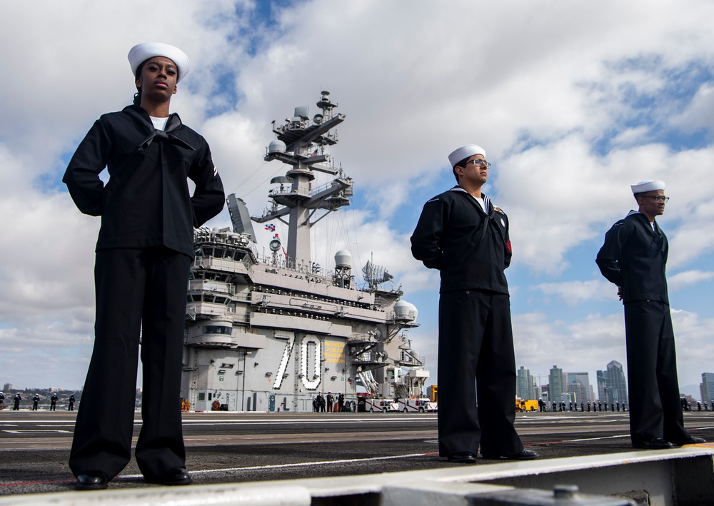 USS Carl Vinson (CVN 70) Sailors Man the Rails while departing San Diego