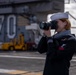 USS Carl Vinson (CVN 70) Sailors Man the Rails while departing San Diego