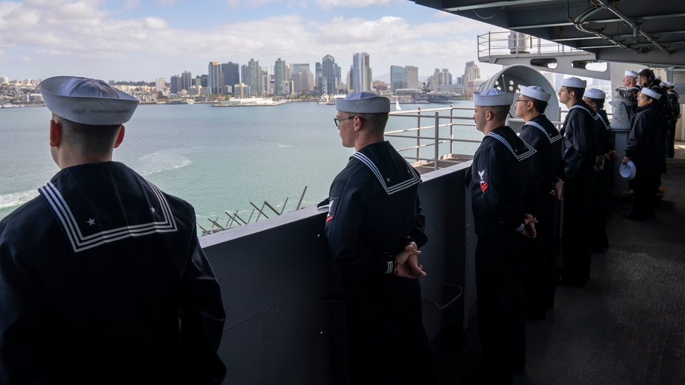 USS Carl Vinson (CVN 70) Sailors Man the Rails while departing San Diego